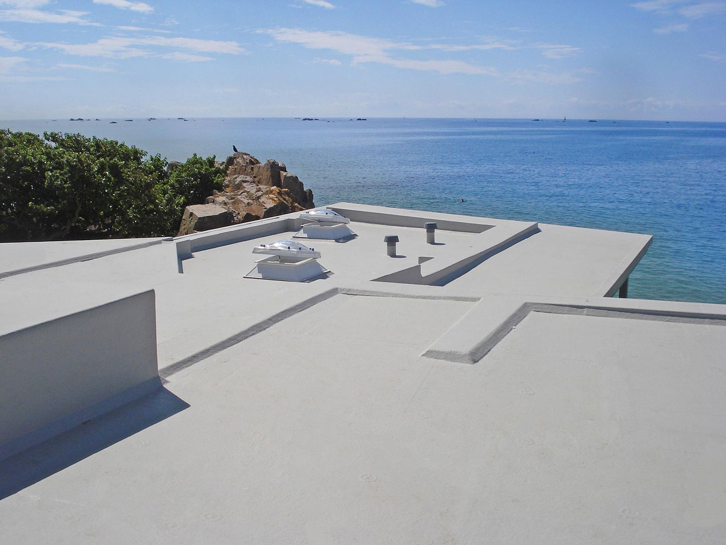 restec-home-pic marbella roofing picture of a waterproofed roof with the sea in the background